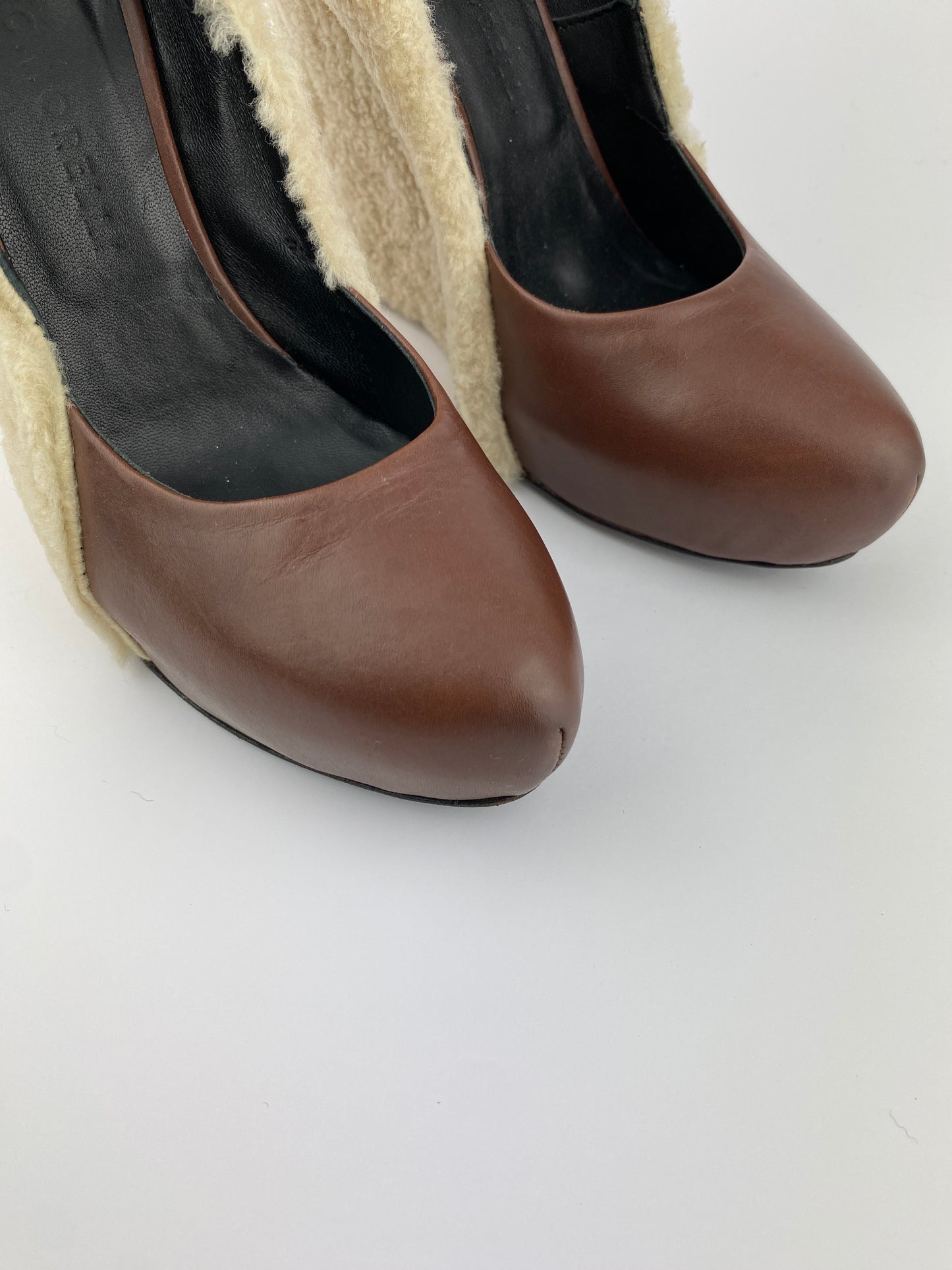 FUR WEDGE PUMPS